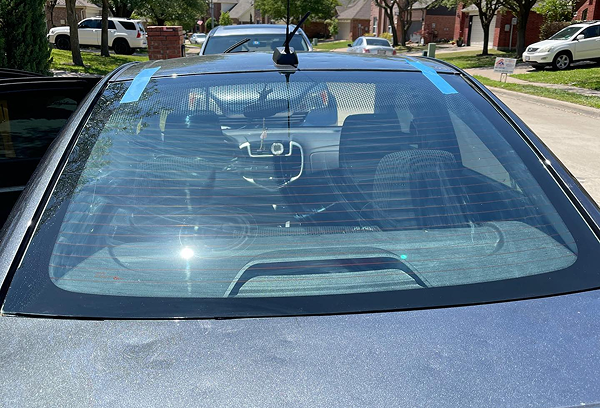 back_glass_hail_damage_after 1